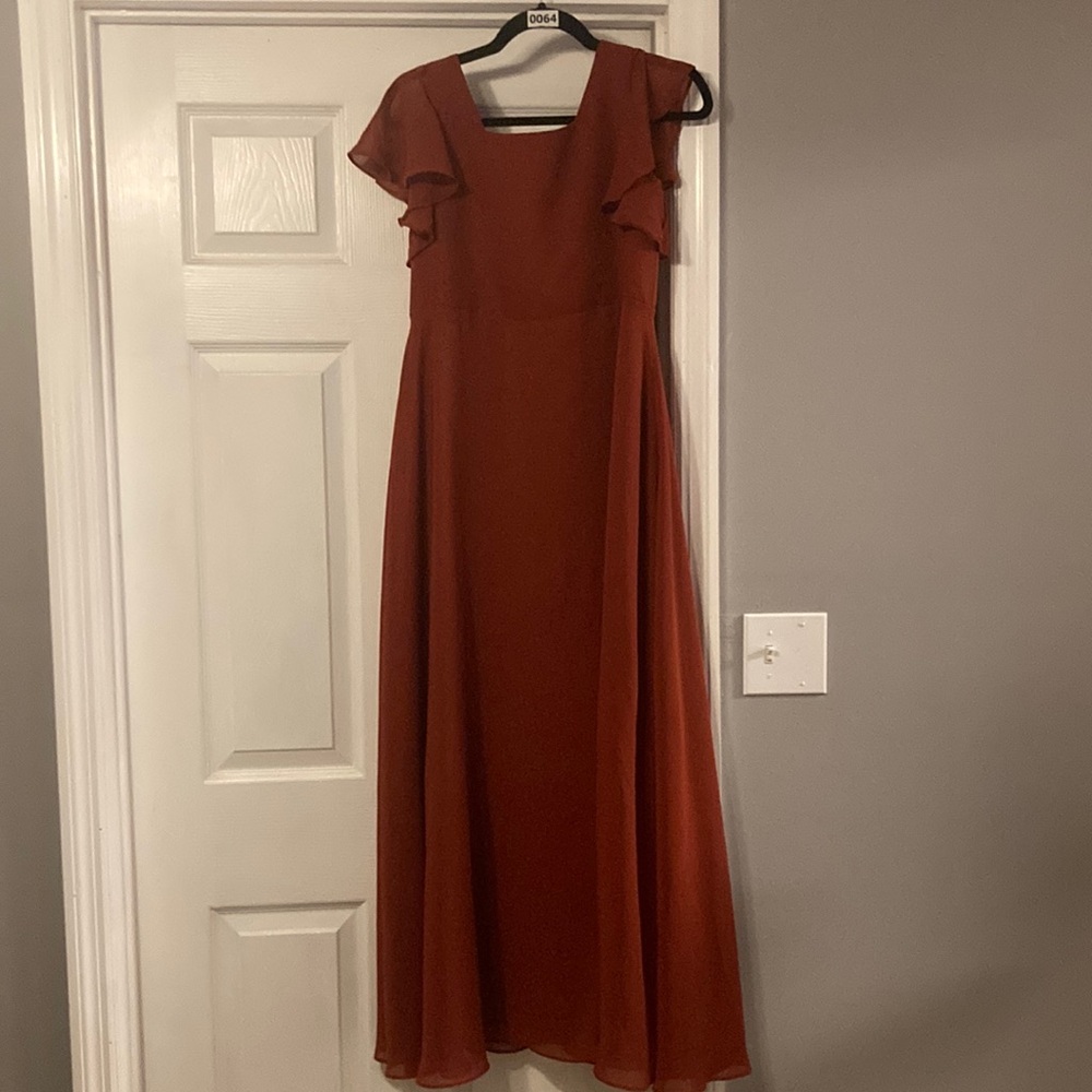 Girls size 16 dress Chiffon shortsleeved with front split.